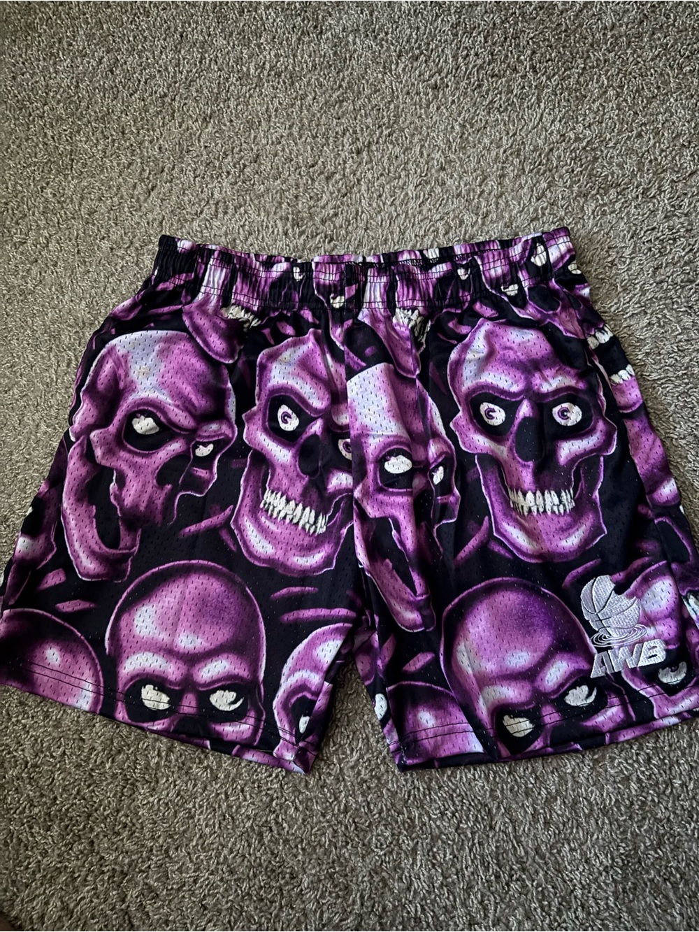 Purple skull mesh shorts